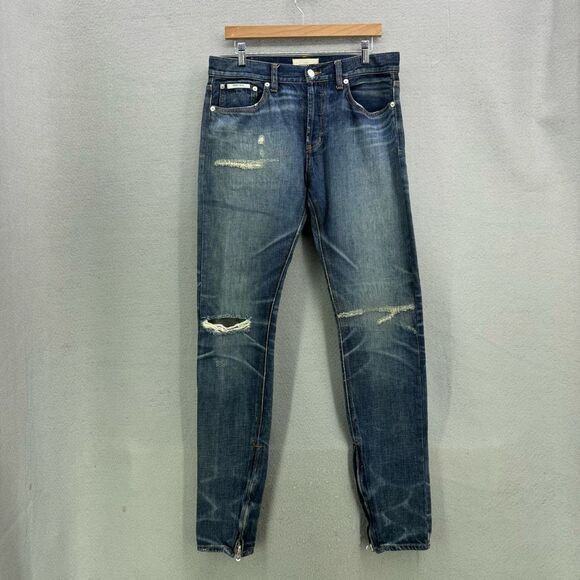 FEAR OF GOD ESSENTIALS OG DISTRESSED ZIPPER DENIM JEANS Size 32
